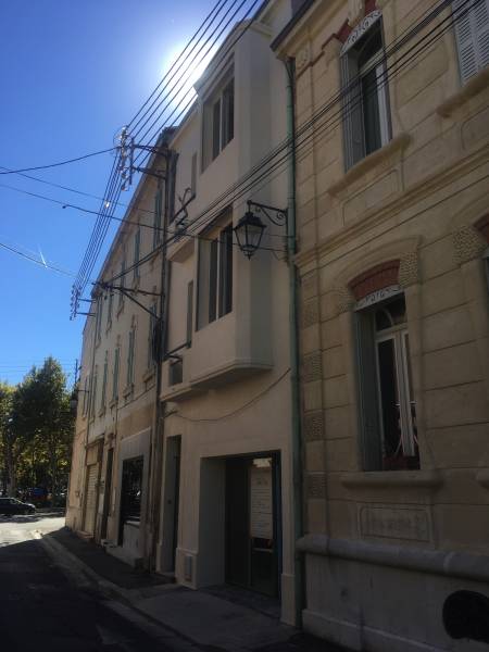 Aménagement d'un centre médical dans une maison de ville à Salon de Provence - enduits de la façade